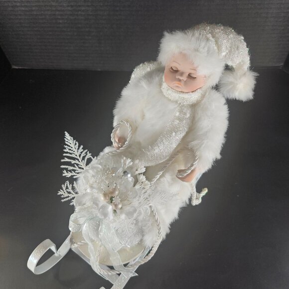 All White Heritage Signature Collection Porcelain Baby Doll in Winter Sleigh - Picture 2 of 11
